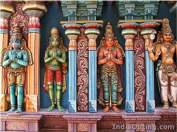 colourful sculptures on the pillars